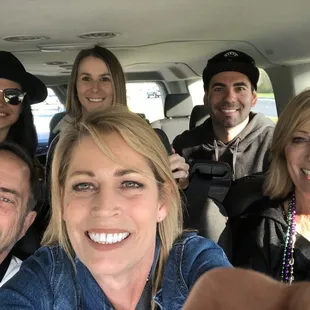 Is enjoying our comfortable ride to the hotel.