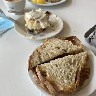 Breakfast sandwich with veggie sausage, cinnamon roll, and Avocado Toast