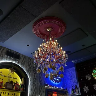 a chandelier hanging from the ceiling