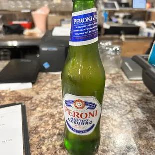 Peroni is a smooth Italian beer that pairs nicely with pizza!