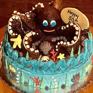 a birthday cake with an octopus on it