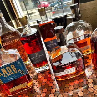 a variety of liquor bottles