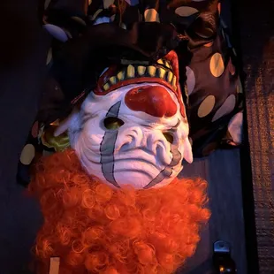 a clown's head with red hair