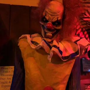 a creepy clown with red hair