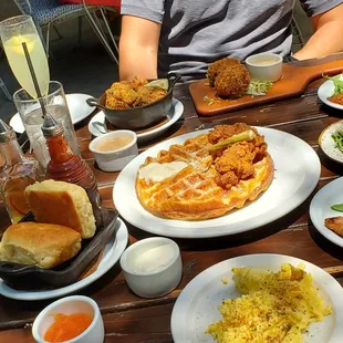 biscuits, fried catfish nuggets, salmon croquettes, chicken &amp; waffle, deviled eggs, sides of eggs, chicken apple sausage, bacon