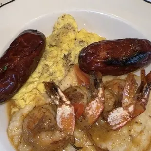 Shrimp N' Grits and scrambled eggs with chicken sausage , roasted peppers and shrimp butter