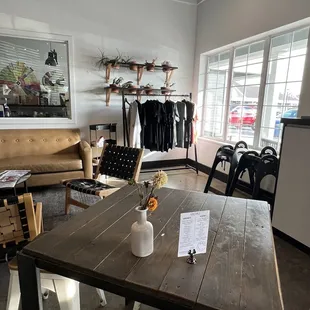 a wooden table and chairs
