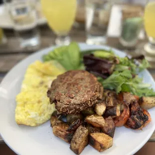 POST BREAKFAST  two eggs fried, scrambled egg , roasted tomato, mixed greens, avocado, roasted potatoes  Side of Beyond sausage