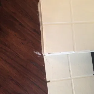 Cracked tile and splattered paint