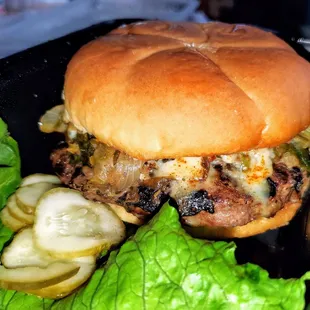 Italian Burger. Topped w/ sautéed Italian greens, and hot peppers. The peppers weren&apos;t hot though.