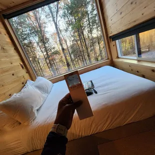 The thermostat is controlled by a remote. Mine was hidden in the cabinet.