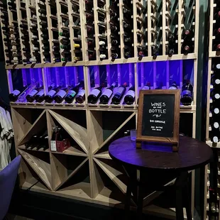 a wine rack with bottles of wine