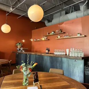 a table with a vase of flowers on it