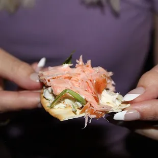 The Smoked Salmon is made with whipped feta, wild arugula, dill, crostini, &amp; lavash bread.