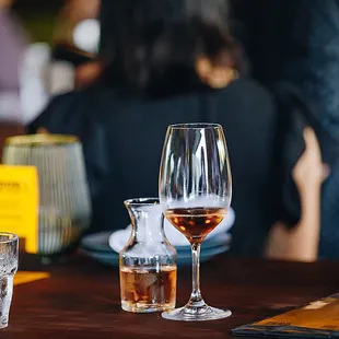 two glasses of wine on a table