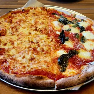 a cheese and spinach pizza