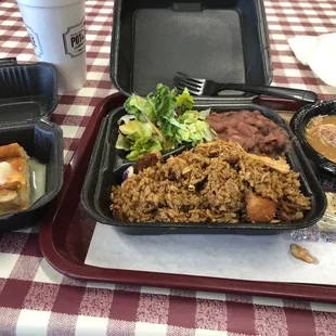 Jambalaya meal with bread pudding.