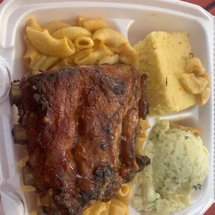 BBQ Ribs with Mac &amp;cheese, potatoes salad and cornbread