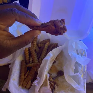 Wings are bite size &amp; fries were burnt