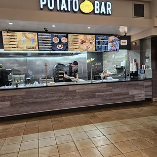 Located in the food court next to Panera