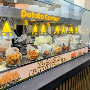 a man preparing food at a counter
