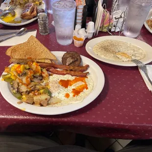 Eggs potatoes loaded and double bacon sausage and 1/2 order biscuits and gravy.