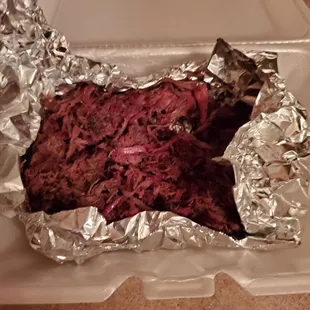 a steak in foil