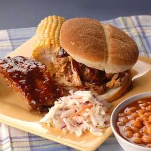 Pulled prork, ribs, baked beans, hand cut slaw, corn