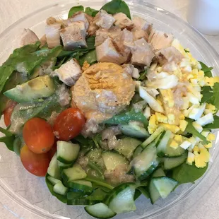 Farmhouse salad with avocados, hummus and vinegarette