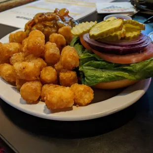 a burger and tater tots