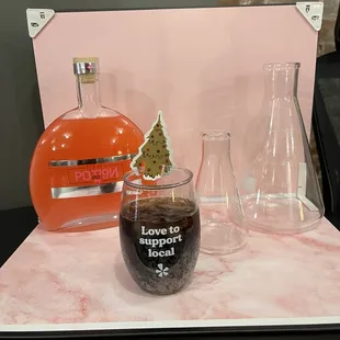 Coke Zero on ice next to the Poti9n.