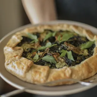 braising greens and fresh cheese tart | squash blossoms, leeks, herbs | photo by Freda Banks