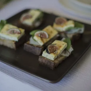 summer on toast | baked ricotta, snow leopard melon, lemon balm, crunchy salt, olive oil | photo by Freda Banks