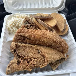 Bass with fires and coleslaw .