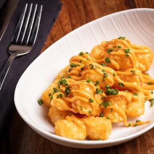 a plate of pasta and a fork