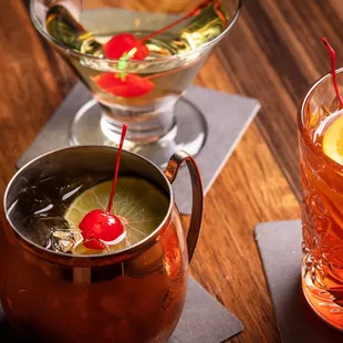 two cocktails on a table