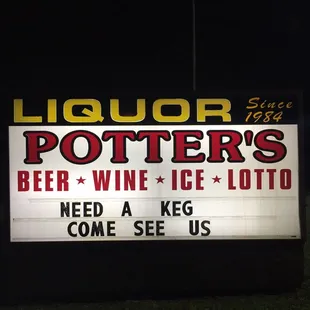 a lighted sign in the dark