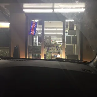 the front of a store at night