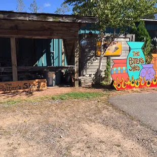 a colorful sign in front of a building