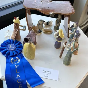 This nativity was part of my civic art club's annual judged show. It's entitled "They came to see"...