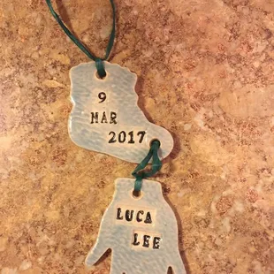 Celebrate a new born with a hanging ornament.