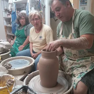 This is him, with old ladies intrigued by his abilities. P.s it took him 3 secs to make this