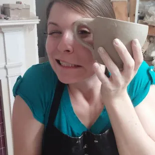 Elizabeth is proud of her first mug