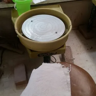 The pottery wheel.