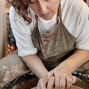 Potter/owner/teacher