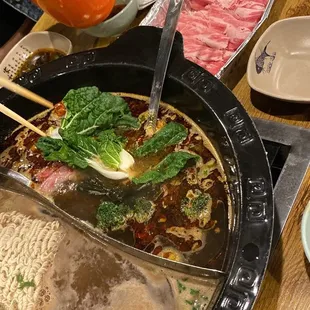 Beef broth and spicy mild broth