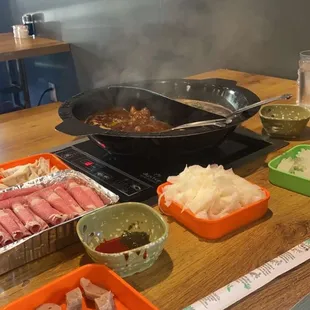 Split soup with beef broth meat balls,prime beef , tripe, dumplings and squid