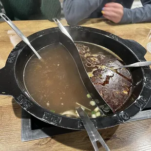 Their house broth and mild broth.