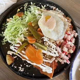 Enchiladas Queretanas with fried egg add on