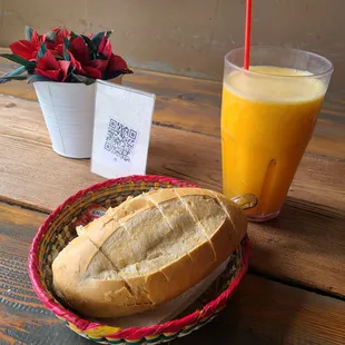 Large Fresh squeezed Orange juice  with a birote for appetizer